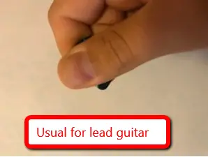 guitar pick slips out of fingers